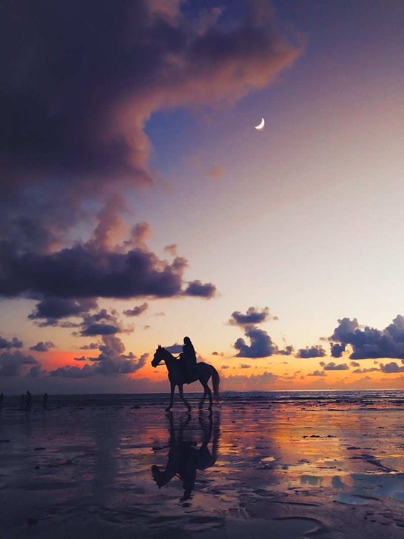 Indigenous Patagonians riding horses